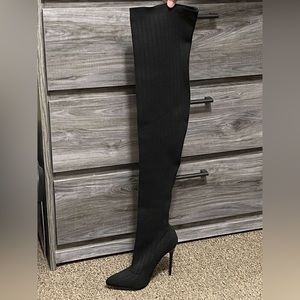 Black thigh high heel boots